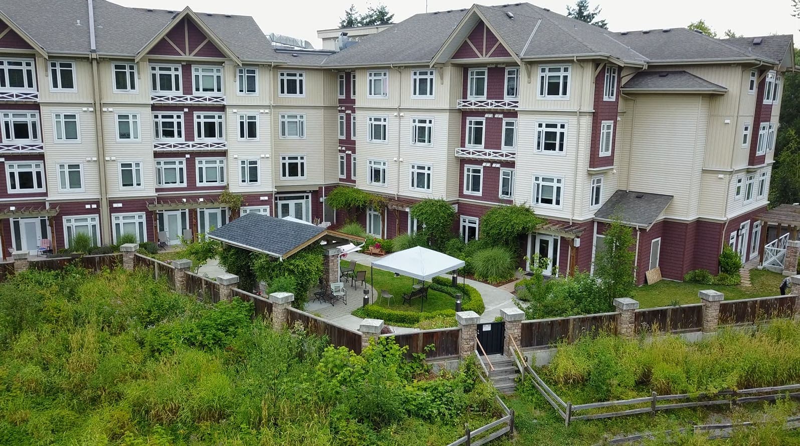 Gardens wrapping around the building