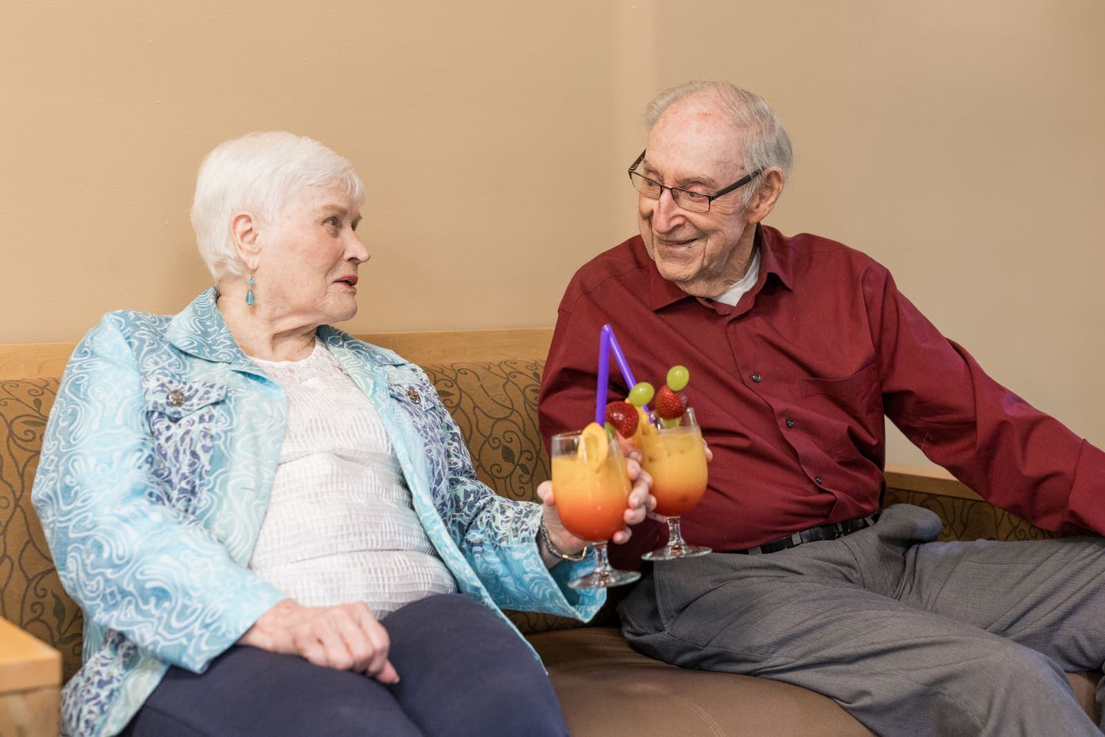 Neighbors raising a glass together