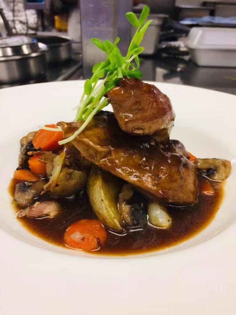 Roast duck with seasonal vegetables