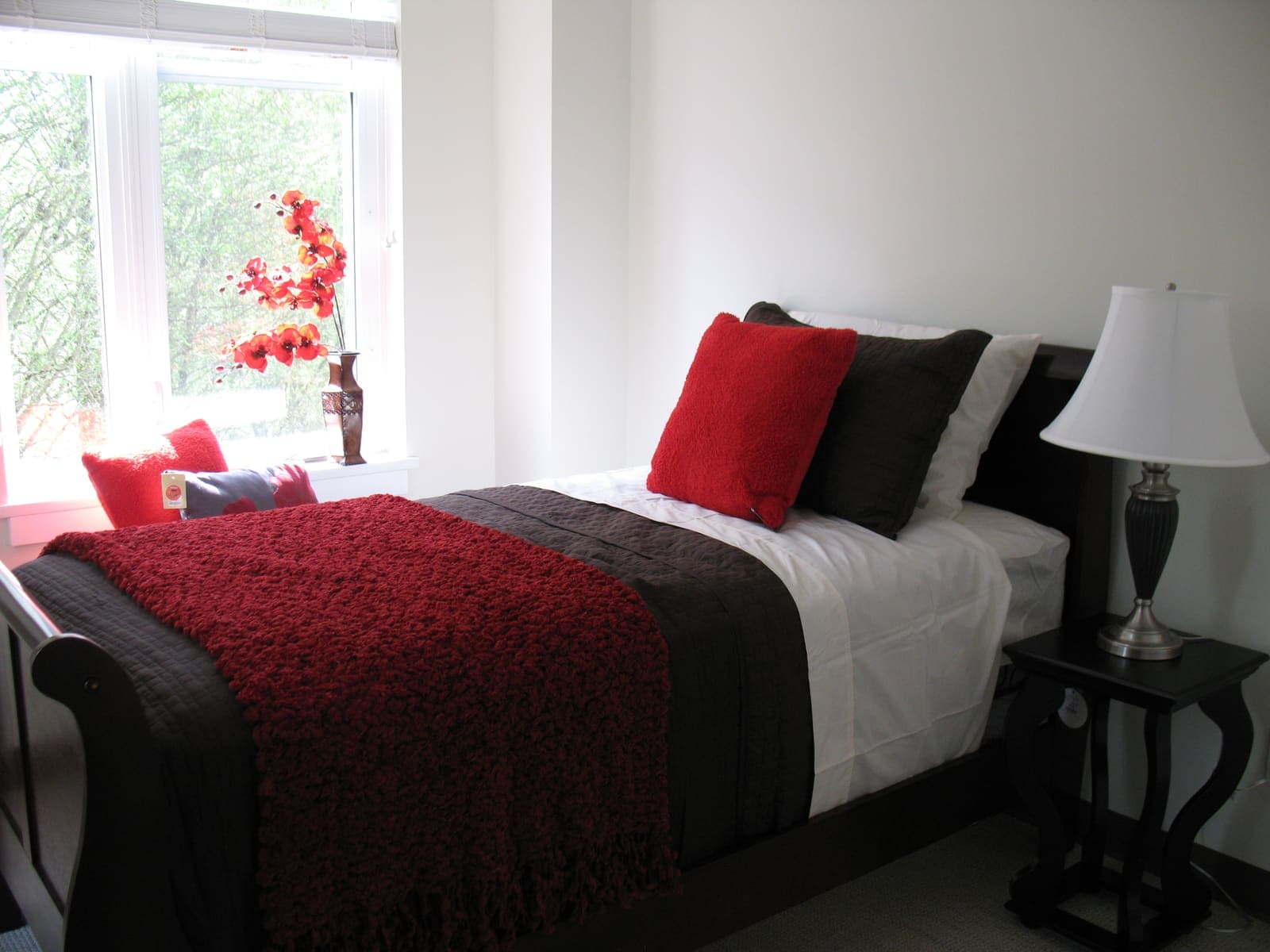 Cozy sleeping area with bright windows
