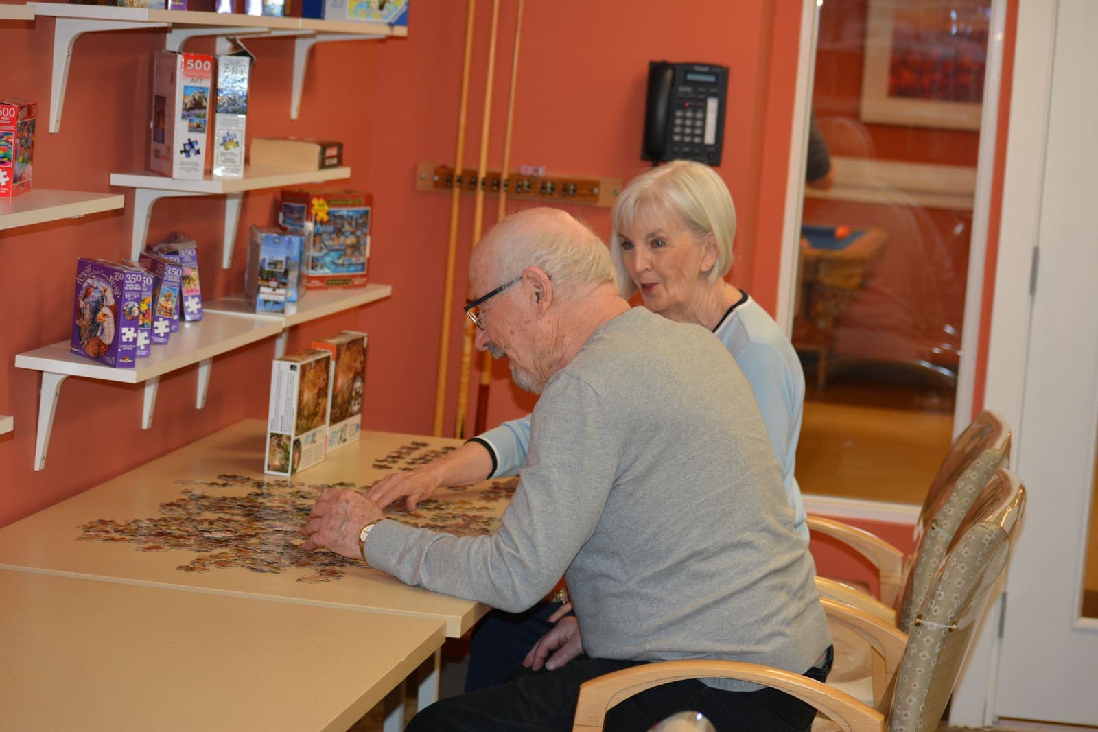 Working on a puzzle in the games room